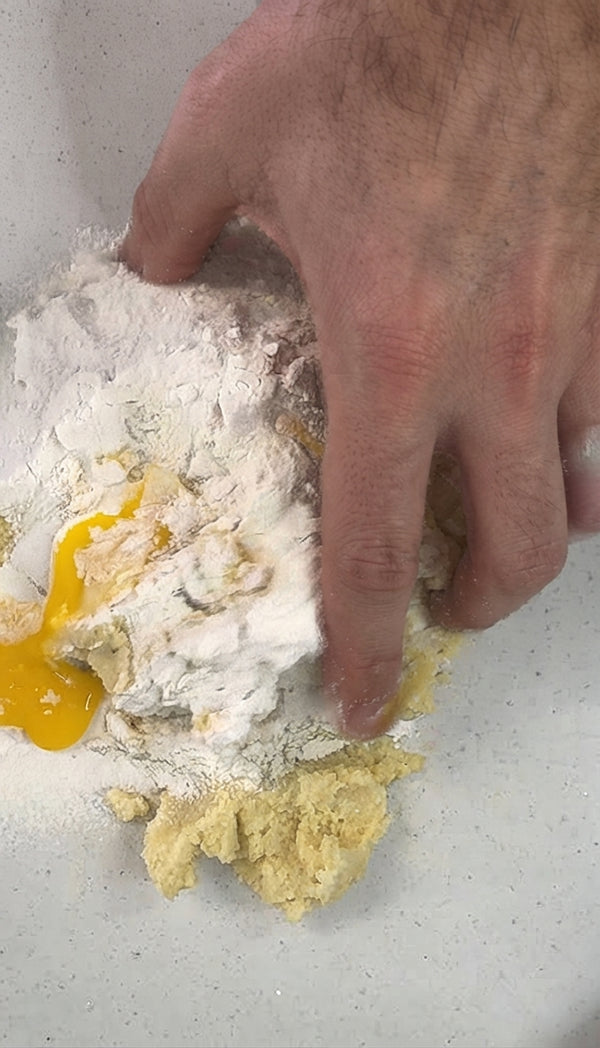 Combine warm leftover polenta (or steamed potatoes) with egg yolk, 1 tbsp Parmesan, salt, black pepper, and a splash of olive oil.