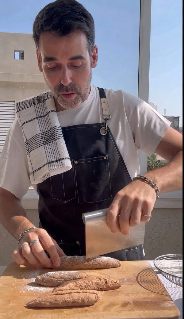 Lightly dust the work surface with extra starch. Divide dough into 4 portions, roll each into long ropes (1.5 cm thick), and slice into small bite-sized gnocchi pillows. Press gently with a fork for classic ridges.