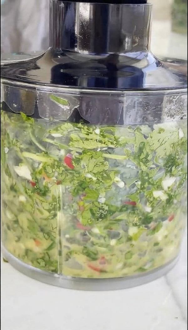 Bloom paprika and turmeric in hot oil for 30 seconds, then pour in warm water. Bring to a gentle boil.