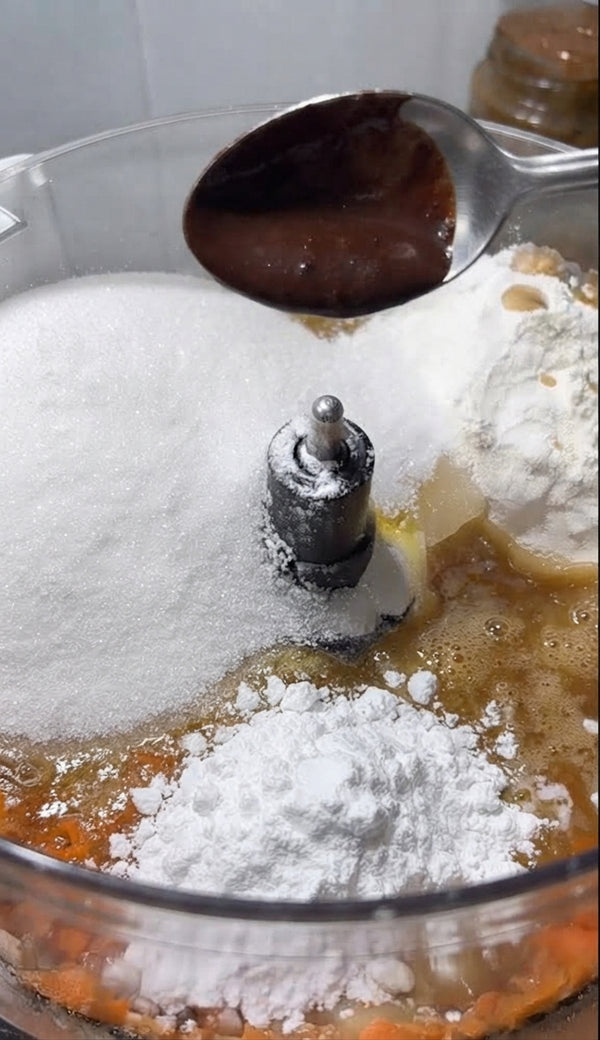 Add flour, baking powder, baking soda, cinnamon, and salt. Pulse just until combined into a uniform batter. Fold in chopped walnuts.