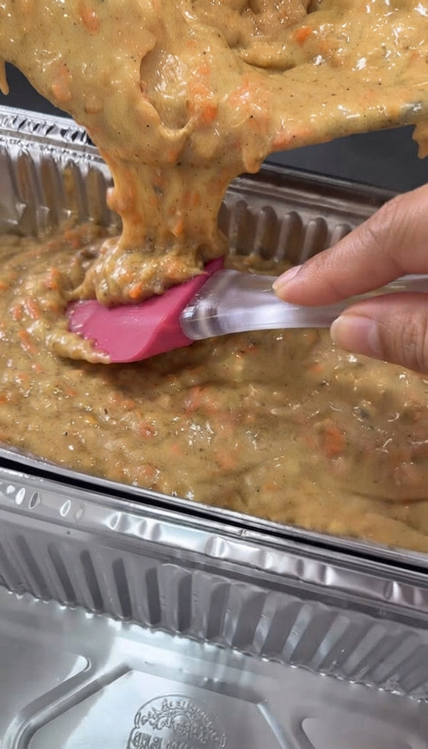 Add eggs, oil, and sugar directly to the bowl with the carrots and blend until smooth.