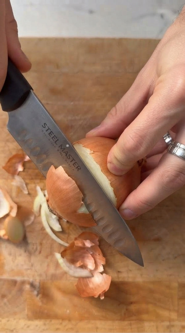 Peel the onions. Using a sharp knife, make a single vertical cut from the top to the stem, stopping at the center core. Soak onions in hot salted water for 35 minutes until soft and pliable. Finely chop the inner cores and set aside for the filling.