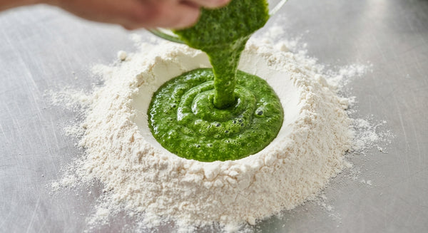 Melt butter in a saucepan over medium heat, add flour, and whisk constantly for 1–2 minutes to create a blonde roux. Gradually pour in warm milk while whisking to prevent lumps. Cook until thick and velvety. Season with salt, white pepper, and freshly grated nutmeg.